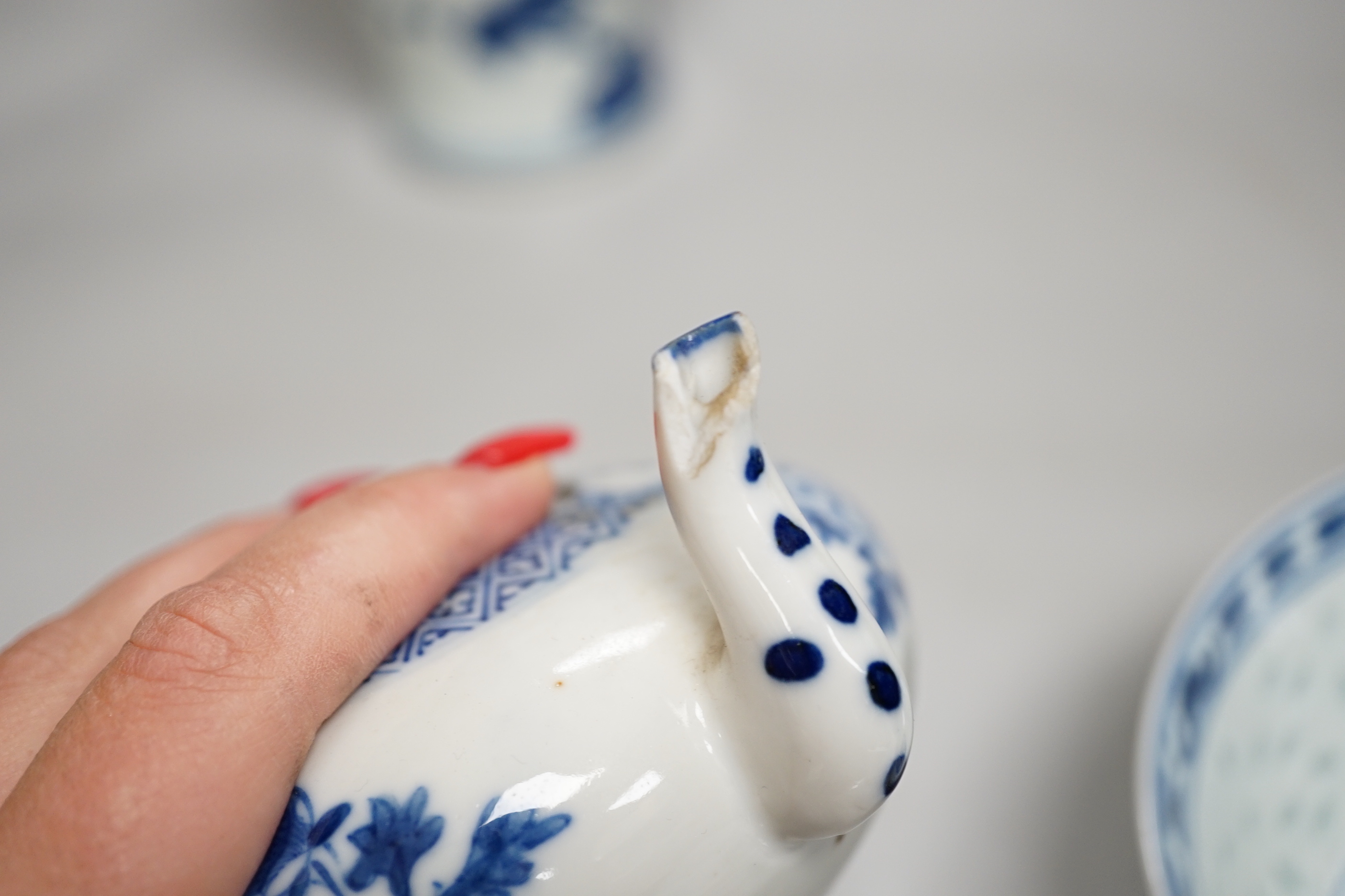 Chinese blue and white ceramics and a miniature famille rose vase, the largest 25cm high